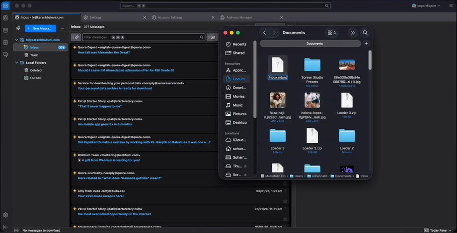 Dark-themed email client open with a pop-up window showing documents and file folders like inbox.mbox and pictures.