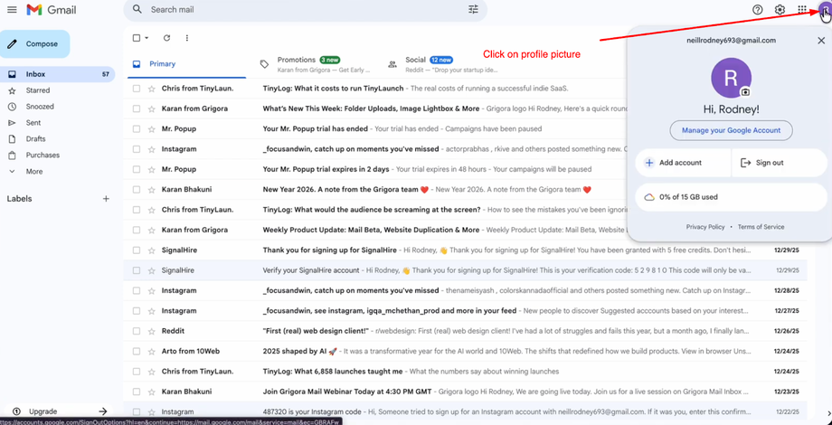Gmail inbox interface with a profile dropdown menu open, showing account details and options.